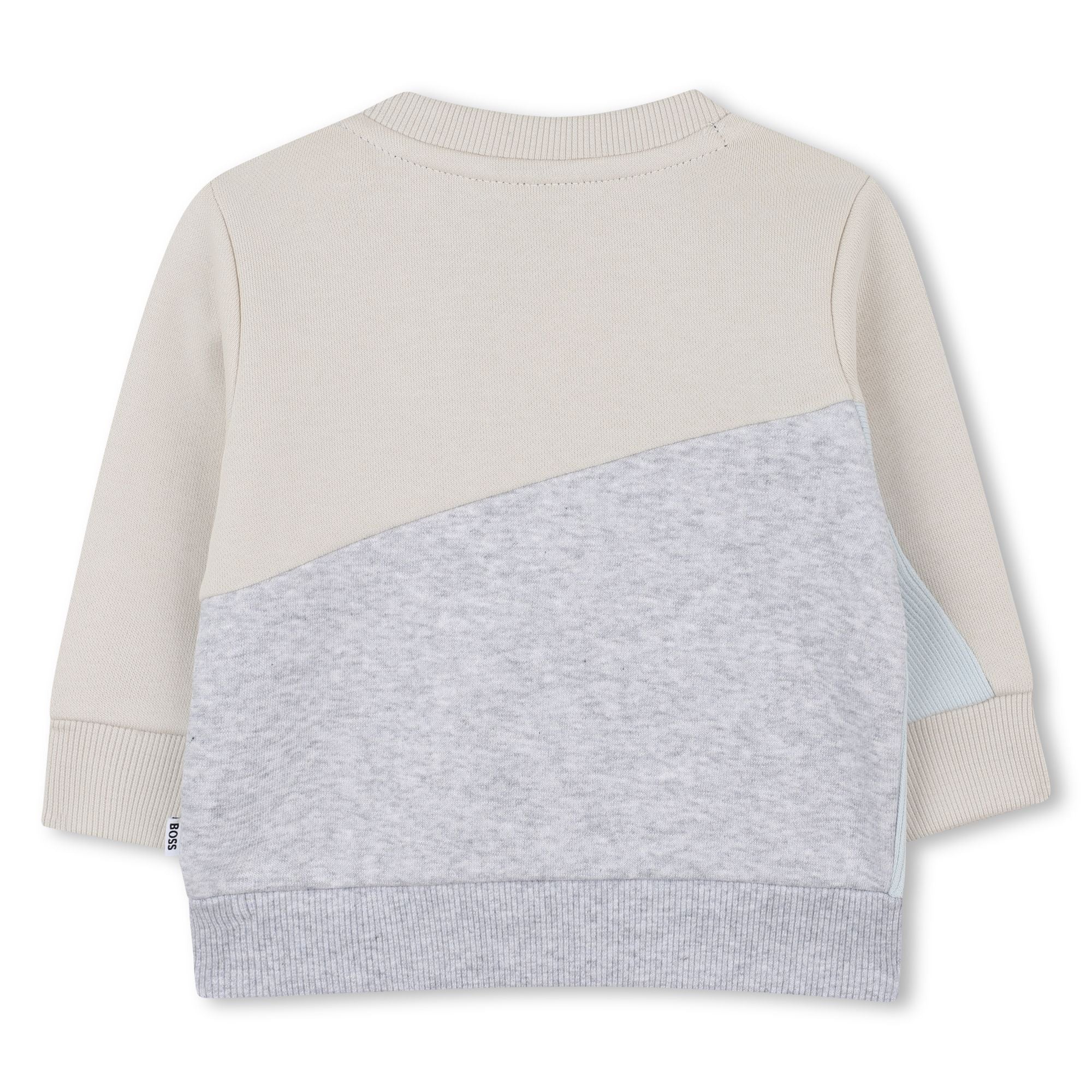 Buzo Loose Fit Recortes Vainilla Pastel